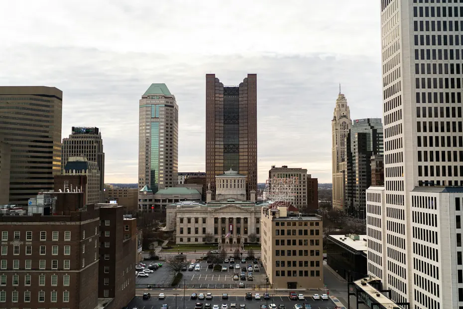 The Ohio Statehouse among high-rise buildings in downtown Columbus