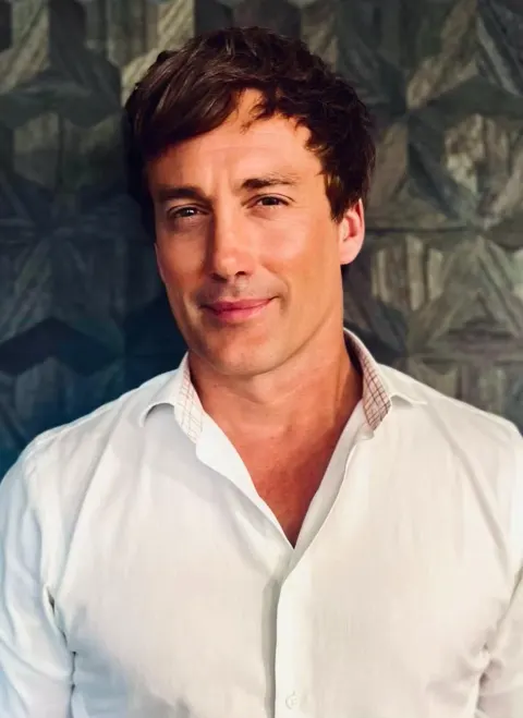 Dr. Adam Brittain